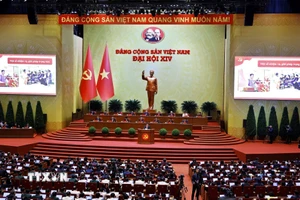 Phiên thảo luận tại hội trường về các văn kiện Đại hội, chiều 21/1. (Ảnh: TTXVN)