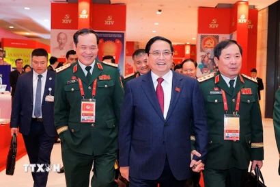 Thủ tướng Phạm Minh Chính đến dự ngày làm việc thứ tư Đại hội XIV của Đảng, sáng 22/1. (Ảnh: TTXVN)