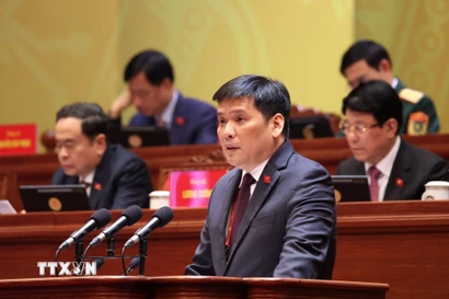 Đồng chí Nguyễn Thanh Bình, Phó Trưởng Ban Tổ chức Trung ương, tham luận về vấn đề “Xây dựng, hoàn thiện tổ chức bộ máy của hệ thống chính trị đáp ứng yêu cầu phát triển đất nước trong kỷ nguyên mới.” (Ảnh: TTXVN)