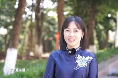 Phó Trưởng ban Tuyên giáo và Dân vận Tỉnh ủy Lai Châu Đào Thị Thanh Nhàn góp ý vào dự thảo các văn kiện trình Đại hội XIV của Đảng. (Ảnh: Việt Dũng/TTXVN)