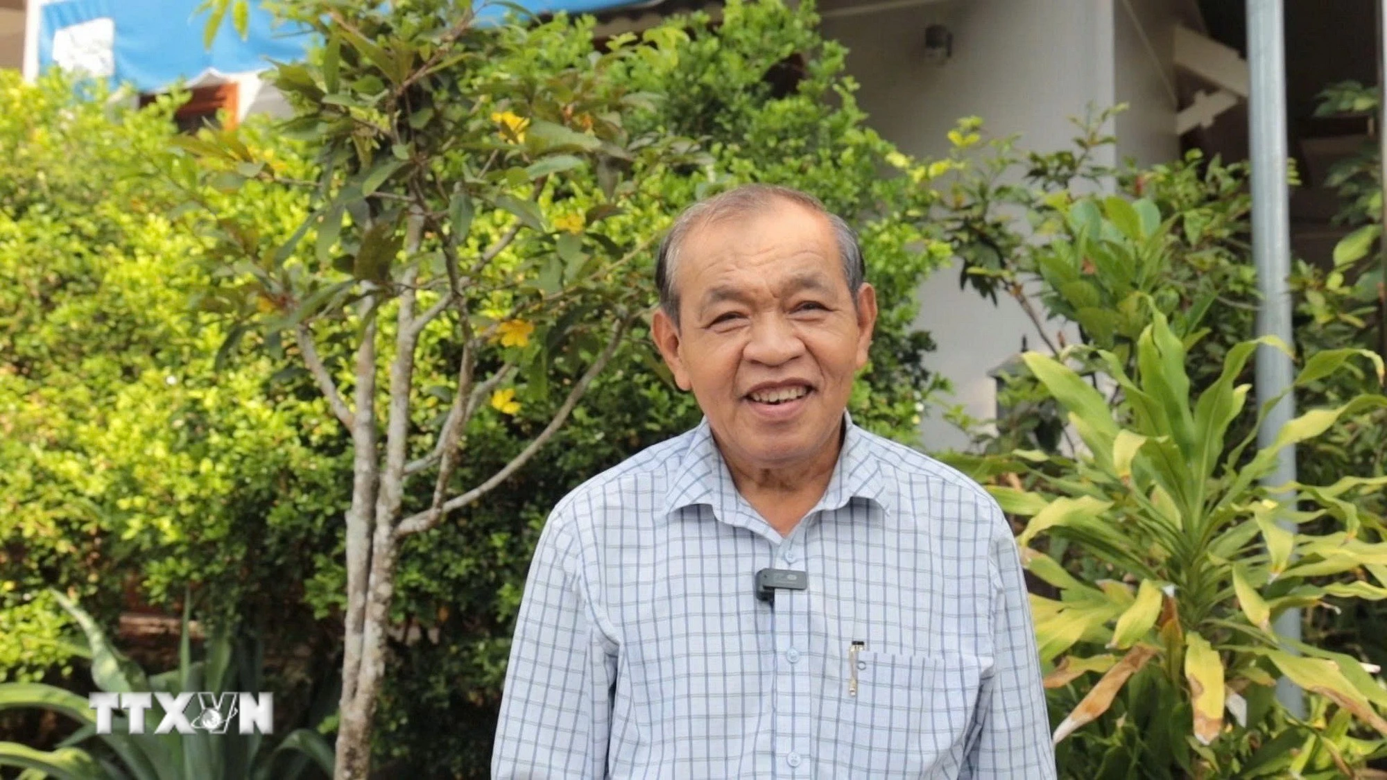 Ông Nguyễn Thành Chinh (Chủ tịch Hội Người cao tuổi, Ban Chấp hành Hội Nông dân xã Tân Hội, tỉnh Tây Ninh) đặt niềm tin vào sự lãnh đạo của Đảng. (Ảnh: Thanh Tân/TTXVN)