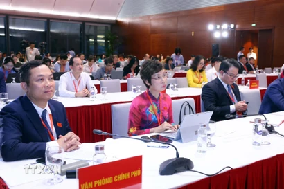 Các đại biểu tham dự buổi họp báo. (Ảnh: Phạm Kiên/TTXVN)