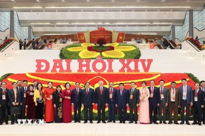 Các đại biểu dự phiên khai mạc Đại hội chụp ảnh lưu niệm. (Ảnh: TTXVN)