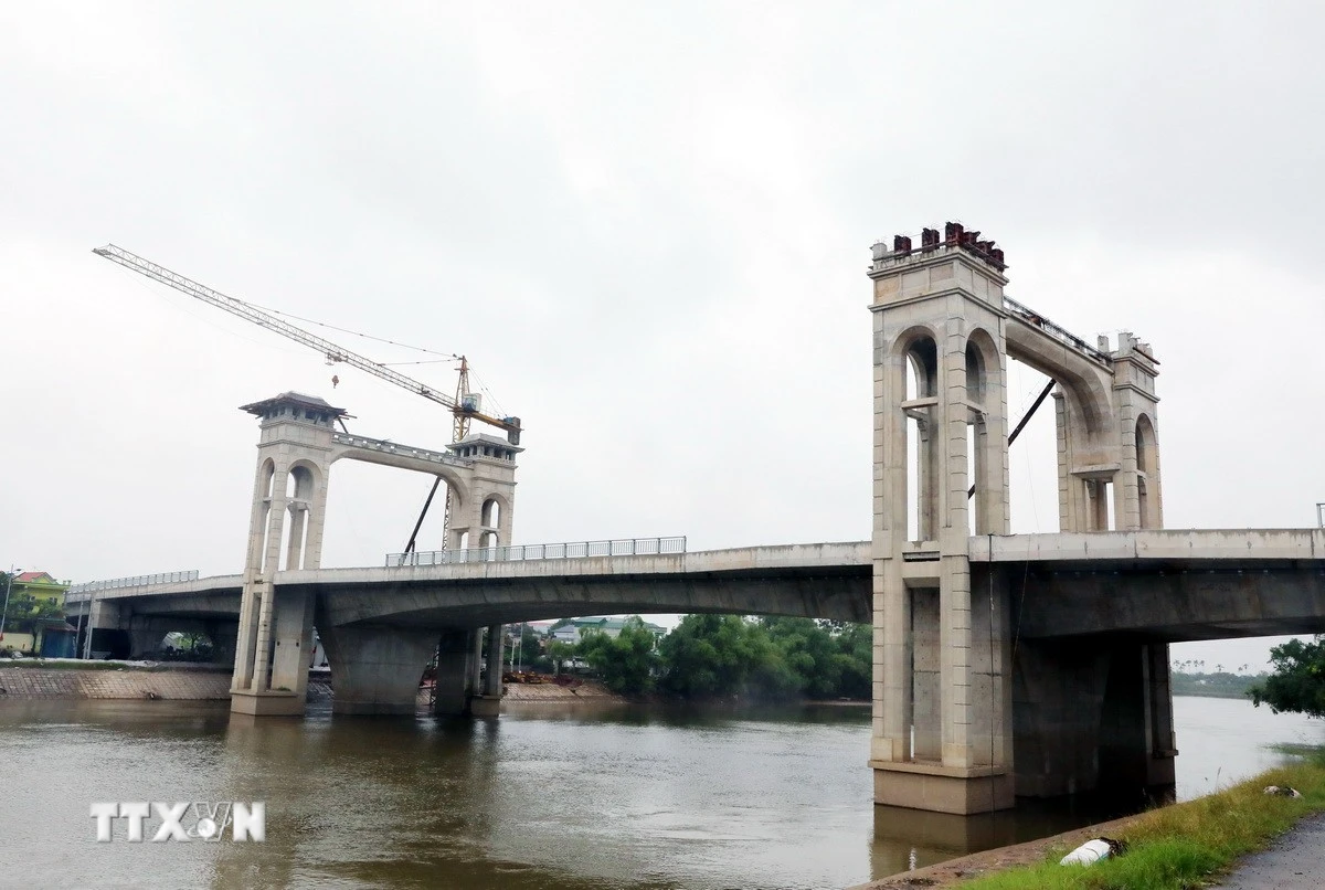 Khởi công từ năm 2022, Cầu Tân Lang sẵn sàng cho lễ khánh thành vào ngày 19/12/2025. (Ảnh: Thanh Tuấn/TTXVN)