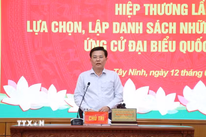Ông Nguyễn Thanh Hải, Phó Bí thư Tỉnh ủy, Chủ tịch Ủy ban Mặt trận Tổ quốc Việt Nam tỉnh Tây Ninh phát biểu tại hội nghị. (Ảnh: Bùi Giang/TTXVN)