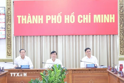 Ông Võ Văn Minh, Chủ tịch Hội đồng Nhân dân Thành phố Hồ Chí Minh, Chủ tịch Ủy ban Bầu cử Thành phố, chủ trì Hội nghị. (Ảnh: Hữu Duyên/TTXVN)