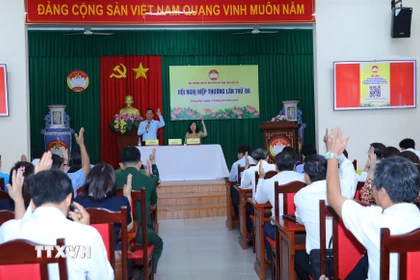 Các đại biểu tỉnh Đồng Nai dự hội nghị biểu quyết thống nhất danh sách chính thức những người ứng cử Đại biểu Quốc hội khóa XVI. (Ảnh: Lê Xuân/TTXVN)