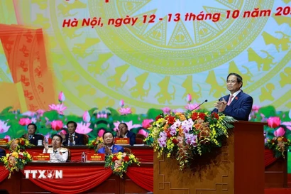 Đồng chí Phạm Minh Chính, Ủy viên Bộ Chính trị, Bí thư Đảng ủy, Thủ tướng Chính phủ phát biểu bế mạc Đại hội. (Ảnh: Văn Điệp/TTXVN)