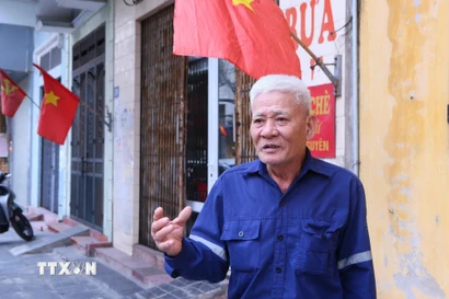 Ông Trần Văn An, Tổ trưởng Tổ dân phố Vị Hoàng 1, phường Nam Định, luôn dành trọn niềm tin tuyệt đối vào sự lãnh đạo của Đảng. (Ảnh: Công Luật/TTXVN)