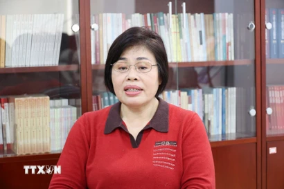 Bà Phan Kim Nga trả lời phỏng vấn phóng viên TTXVN tại Bắc Kinh. (Ảnh: Công Tuyên/TTXVN)