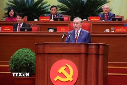 Tổng Bí thư Tô Lâm trình bày Báo cáo của Ban Chấp hành Trung ương Đảng khóa XIII về các văn kiện trình Đại hội XIV của Đảng. (Ảnh: TTXVN)
