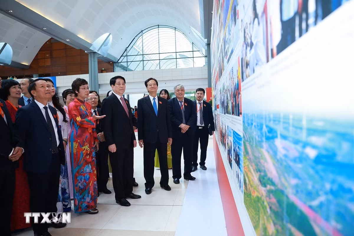 ttxvn-chu-tich-nuoc-tham-quan-trung-bay-anh-cua-6.jpg