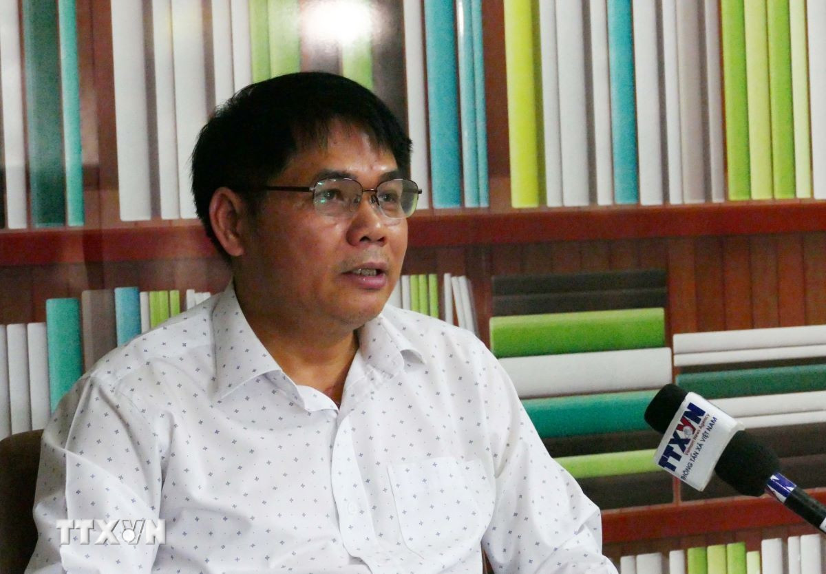 Ông Hoàng Văn Quân, Phó Chủ tịch Hội doanh nghiệp Việt Nam tại Lào, Chủ tịch kiêm Tổng Giám đốc Công ty NNC Pharma, trả lời phỏng vấn. (Ảnh: Xuân Tú/TTXVN)