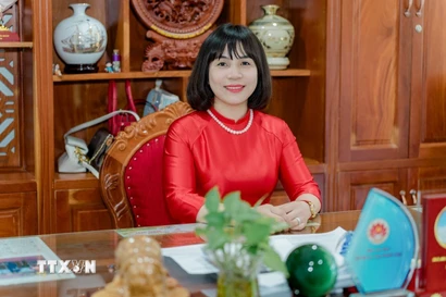 Bà Nguyễn Thị Bích Ly, Phó trưởng Ban Tuyên giáo và Dân vận tỉnh Gia Lai, chia sẻ luôn tin tưởng vào những văn kiện, quyết sách của Đại hội sẽ giúp cho Việt Nam ngày càng phát triển. (Ảnh: Sỹ Thắng/TTXVN)