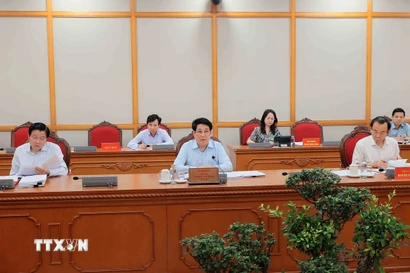 Ủy viên Bộ Chính trị, Chủ tịch nước Lương Cường chủ trì buổi làm việc. (Ảnh: An Đăng/TTXVN)