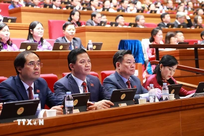 Đoàn đại biểu Đảng bộ tỉnh Thái Nguyên dự phiên thảo luận tại hội trường về các văn kiện Đại hội XIV của Đảng, sáng 21/1. (Nguồn: TTXVN)