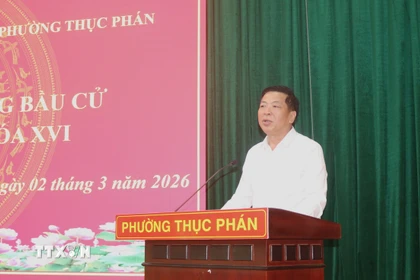 Thiếu tướng Trần Hồng Minh, Ủy viên Ban Chấp hành Trung ương Đảng, Ủy viên Ban Chấp hành Đảng bộ Chính phủ, Bí thư Đảng bộ, Bộ trưởng Bộ Xây dựng, trình bày chương trình hành động. (Ảnh: Chu Hiệu/TTXVN)