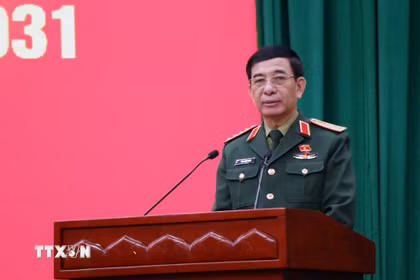 Đại tướng Phan Văn Giang, Bộ trưởng Quốc phòng, trình bày chương trình hành động. (Ảnh: Trần Trang/TTXVN)