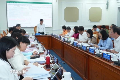 Phiên họp thứ nhất, Ủy ban Bầu cử Thành phố Hồ Chí Minh. (Ảnh: Hữu Duyên/TTXVN)