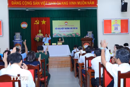 Các đại biểu tỉnh Đồng Nai dự hội nghị biểu quyết thống nhất danh sách chính thức những người ứng cử Đại biểu Quốc hội khóa XVI. (Ảnh: Lê Xuân/TTXVN)
