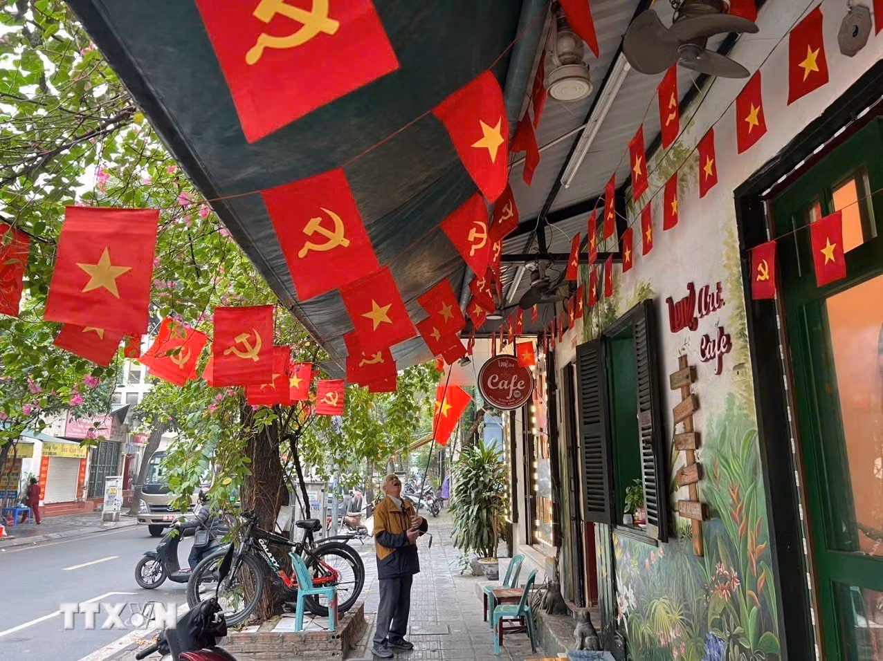ttxvn-chao-mung-dai-hoi-dang-xiv.jpg