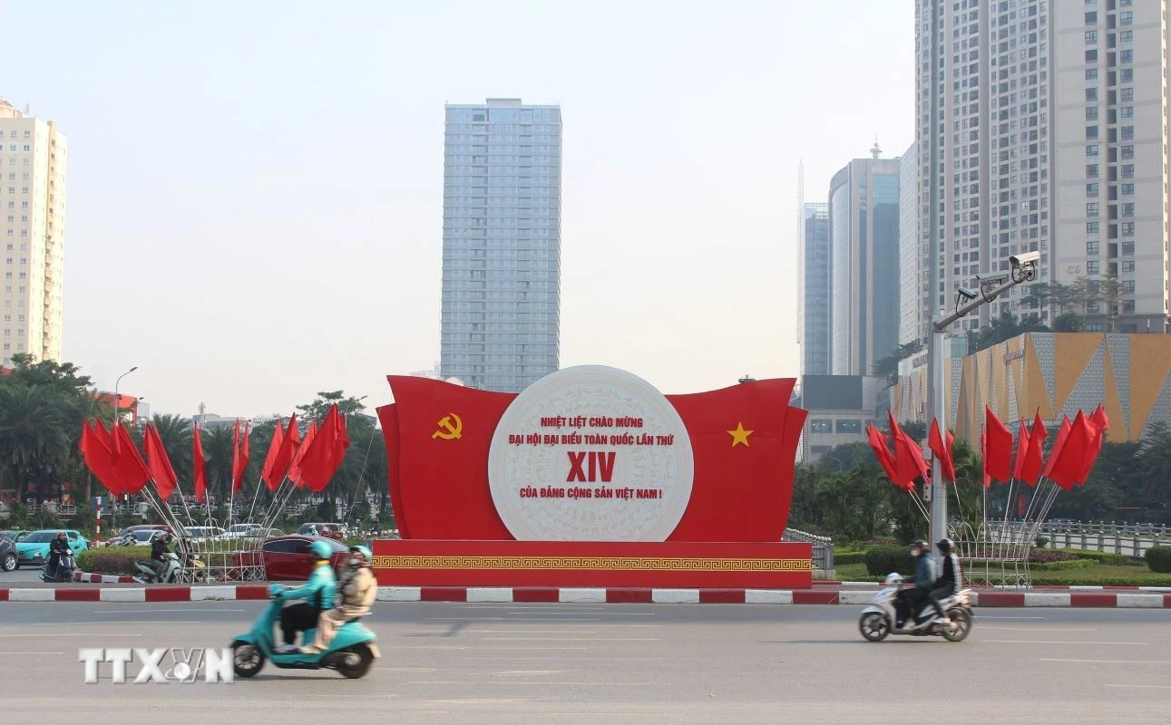 Hà Nội có lúc có mưa, trời rét đậm. (Ảnh: Nguyễn Thắng/TTXVN)