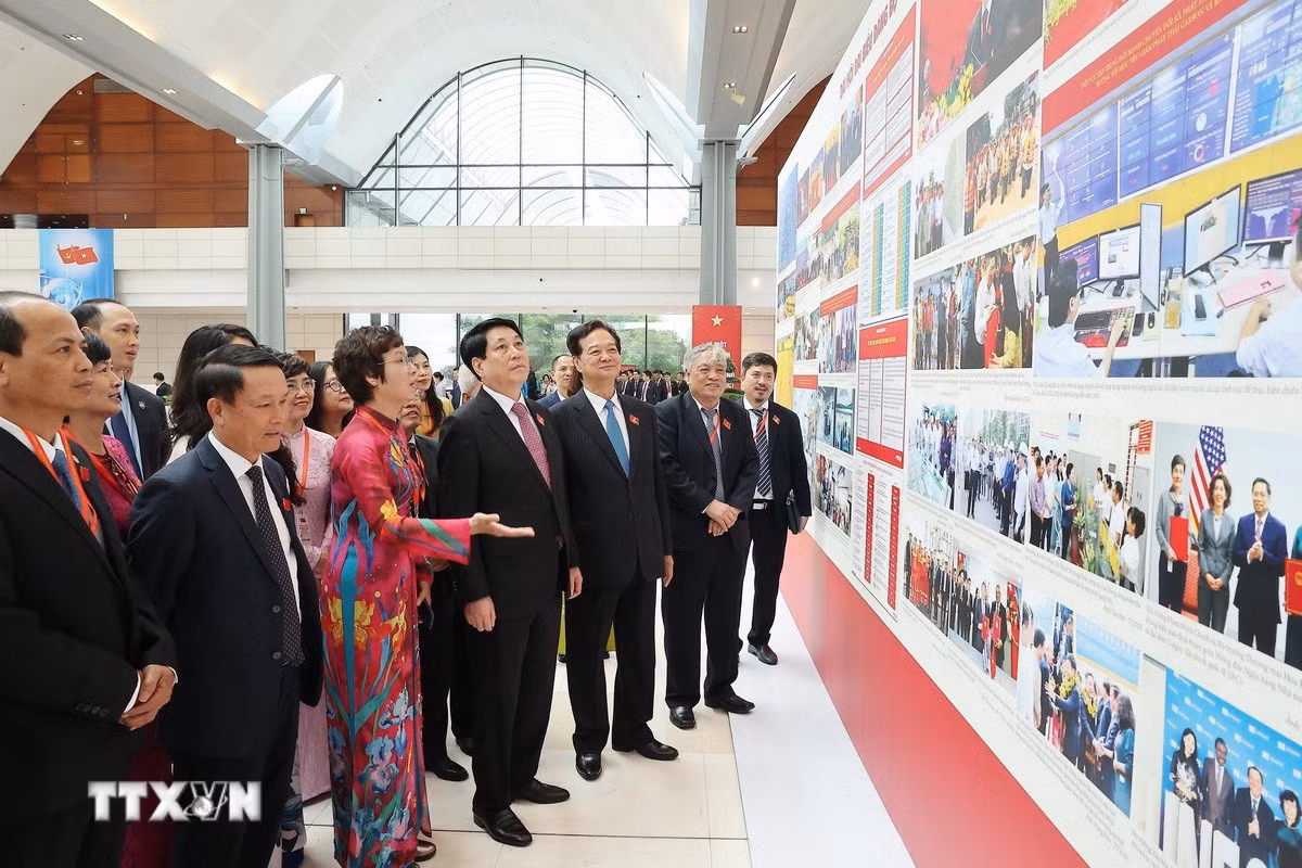 ttxvn-chu-tich-nuoc-tham-quan-trung-bay-anh-cua-2.jpg