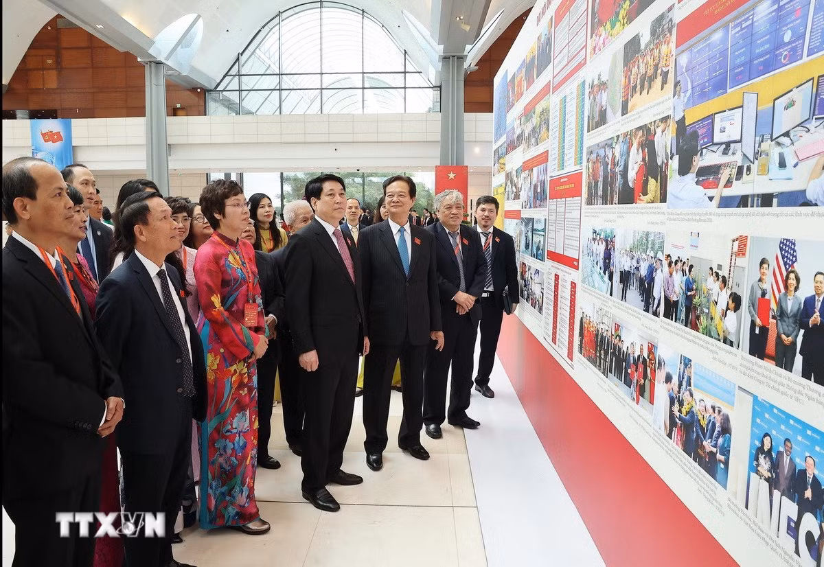ttxvn-chu-tich-nuoc-tham-quan-trung-bay-anh-cua-3.jpg