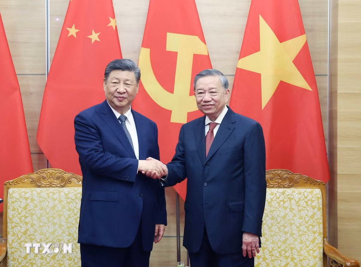 ttxvn-tong-bi-thu-to-lam-chu-tich-nuoc-luong-cuong-cung-tong-bi-thu-chu-tich-nuoc-tap-can-binh-du-lien-hoan-giao-luu-huu-nghi-nhan-dan-viet-trung-23.jpg